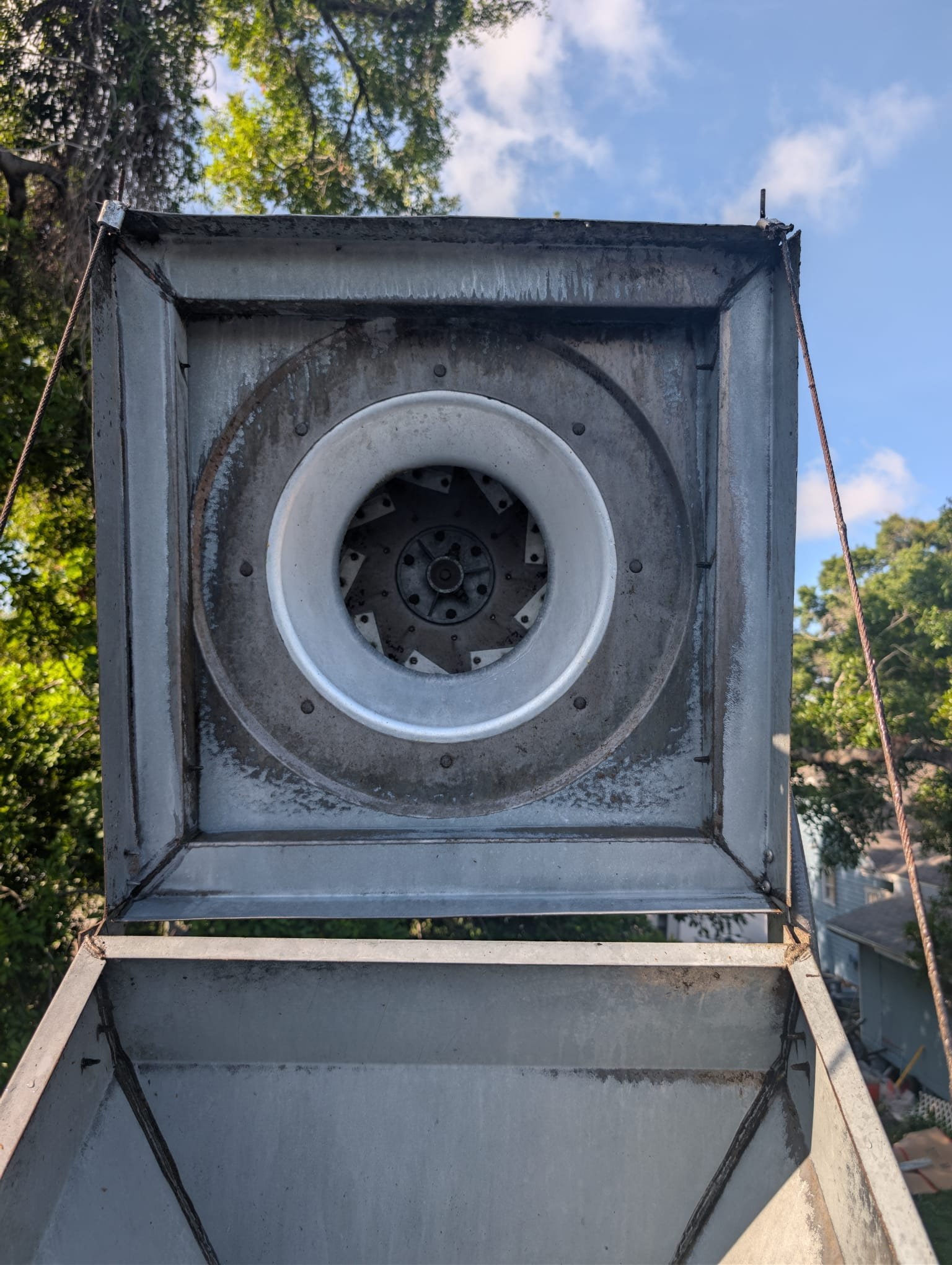 Exhaust hood plenum after cleaning, bare clean stainless steel