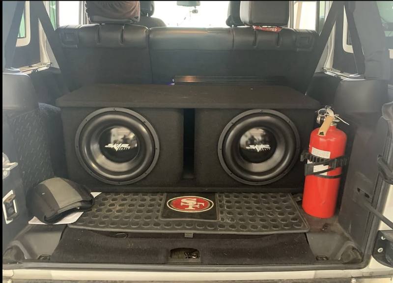 Skar Audio subs in SUV cargo area